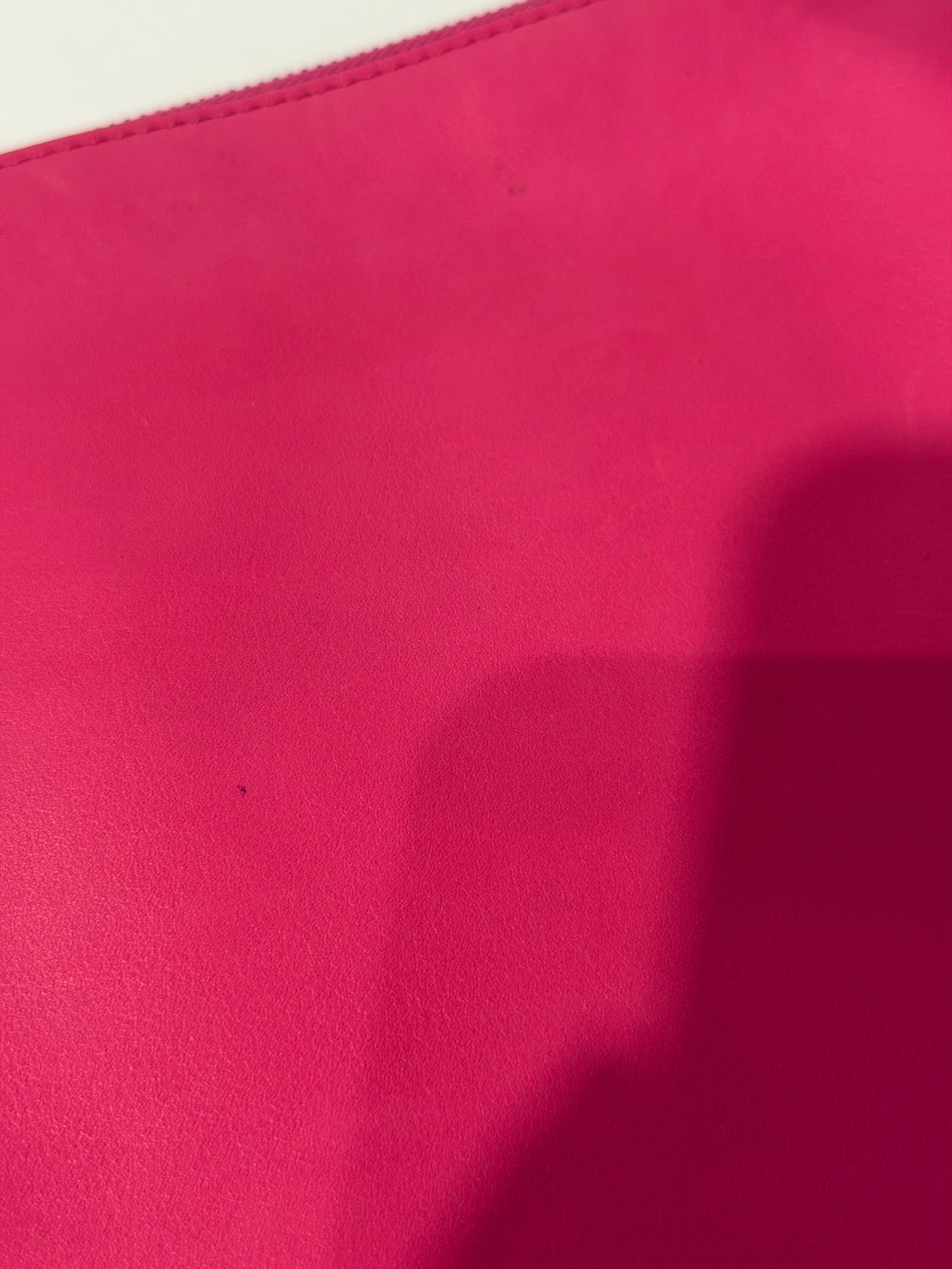 Pochette in Pelle Fucsia di Valentino Garavani