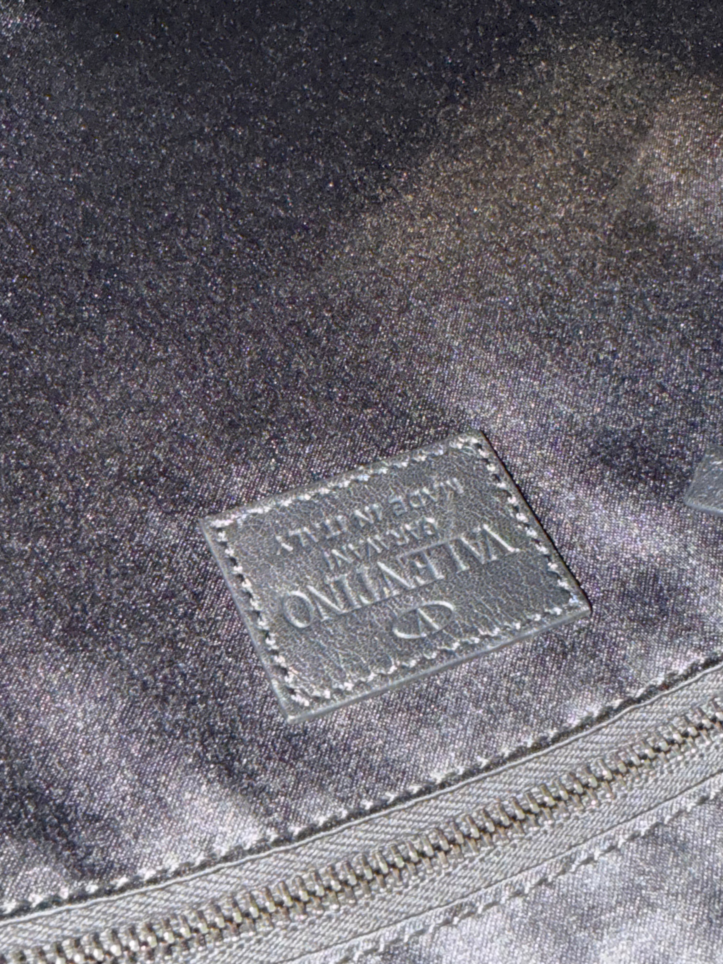Pochette in Pelle Fucsia di Valentino Garavani