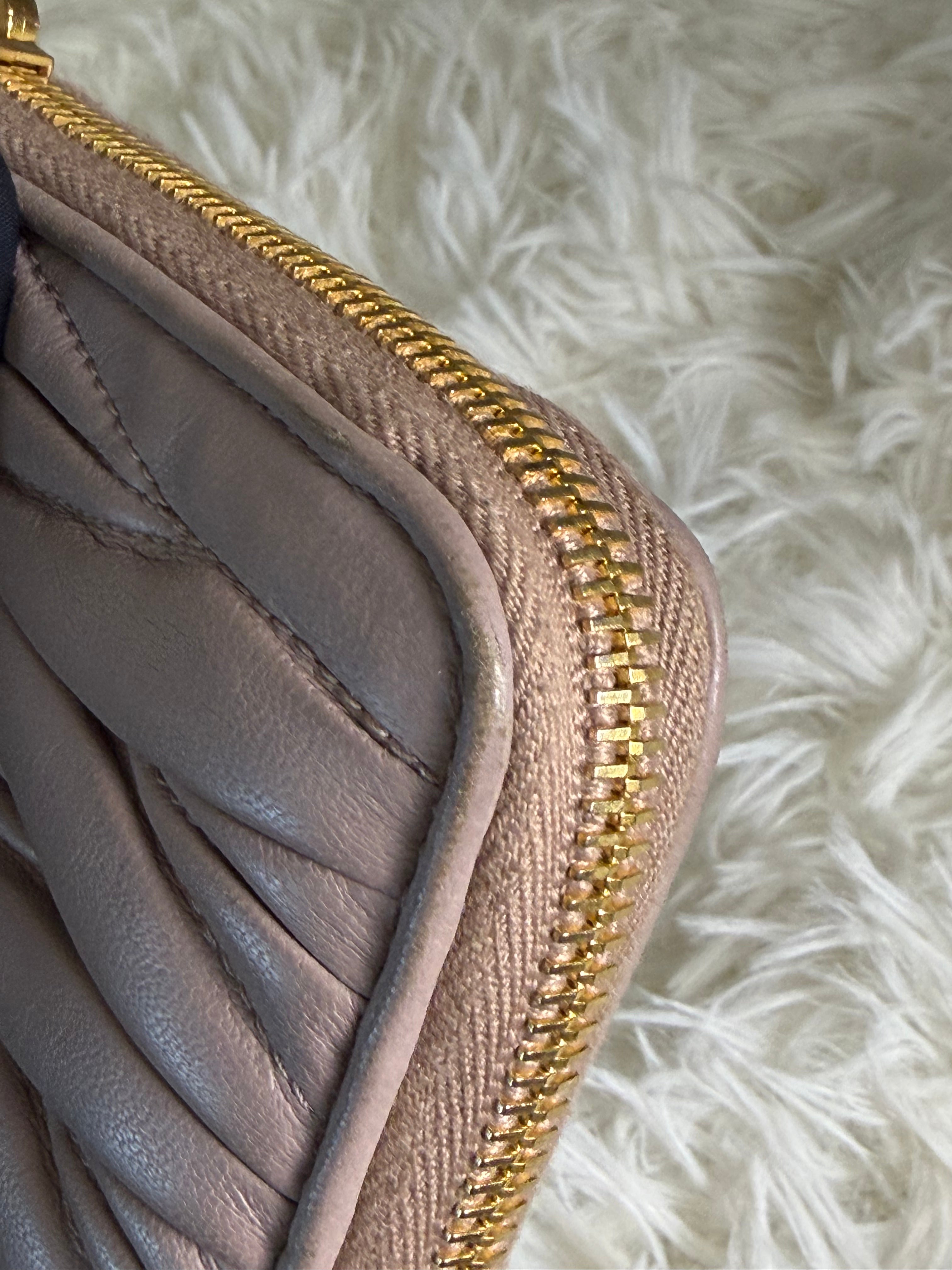 Portafoglio con Zip Miu Miu