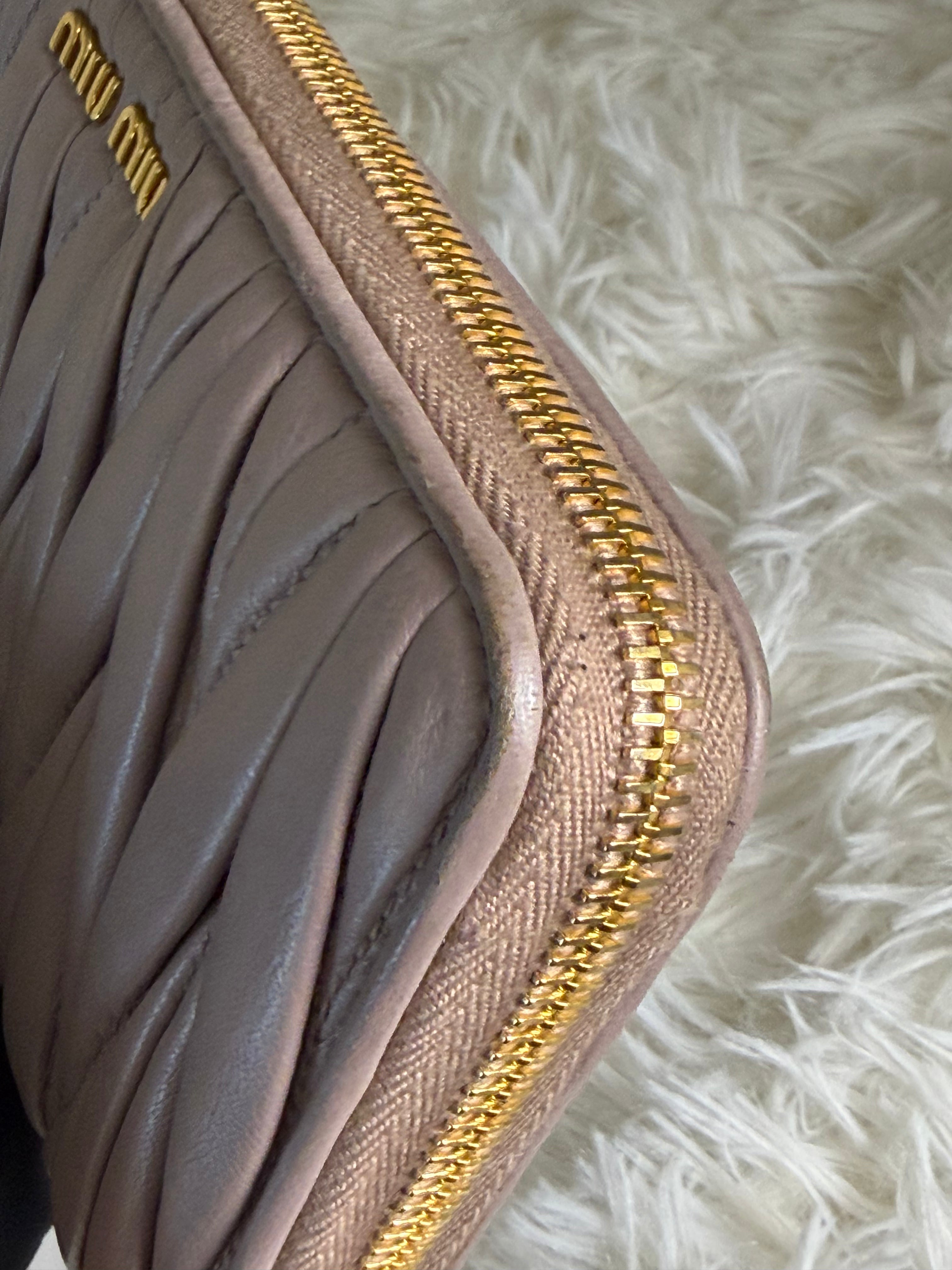 Portafoglio con Zip Miu Miu