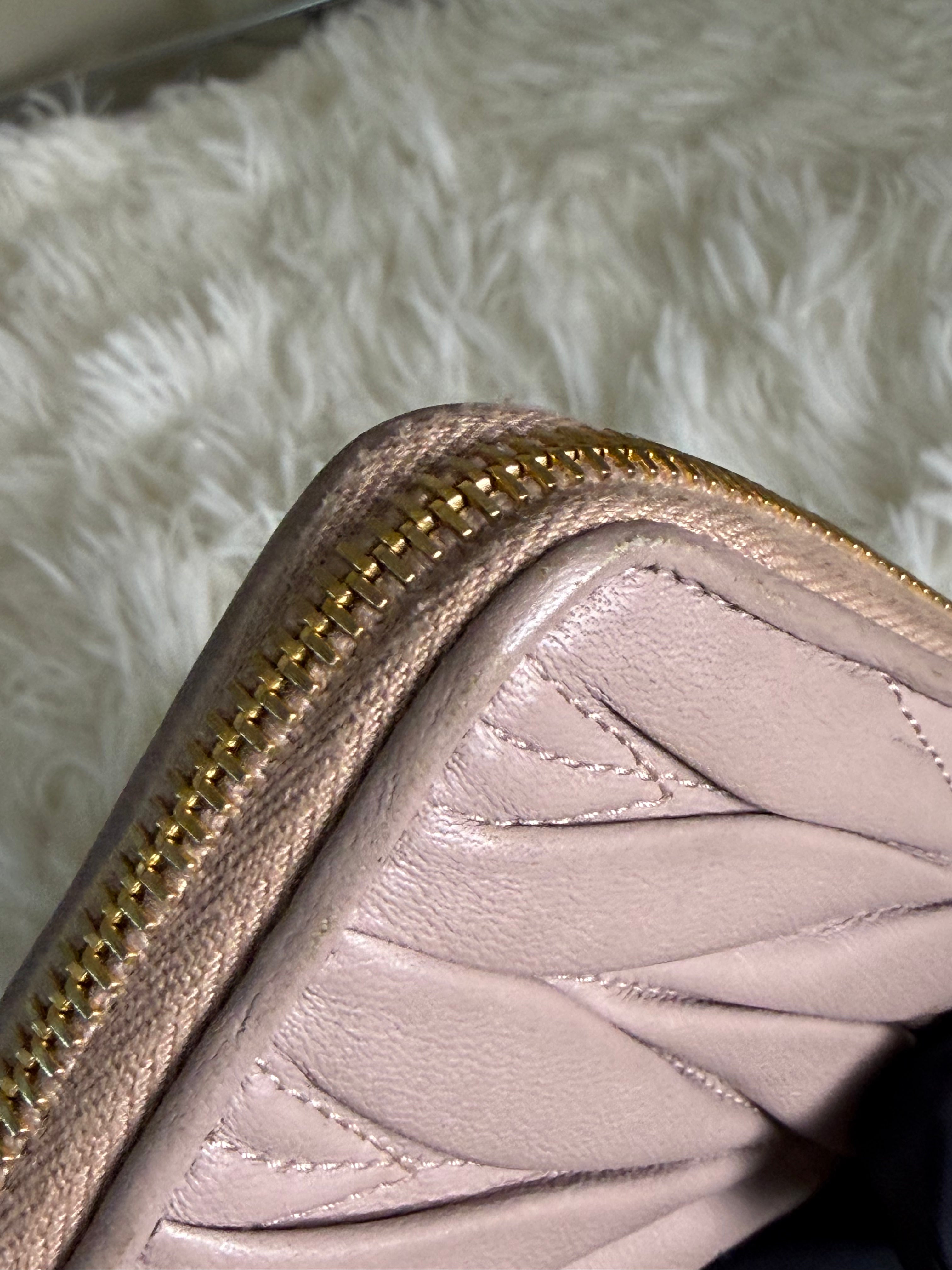 Portafoglio con Zip Miu Miu