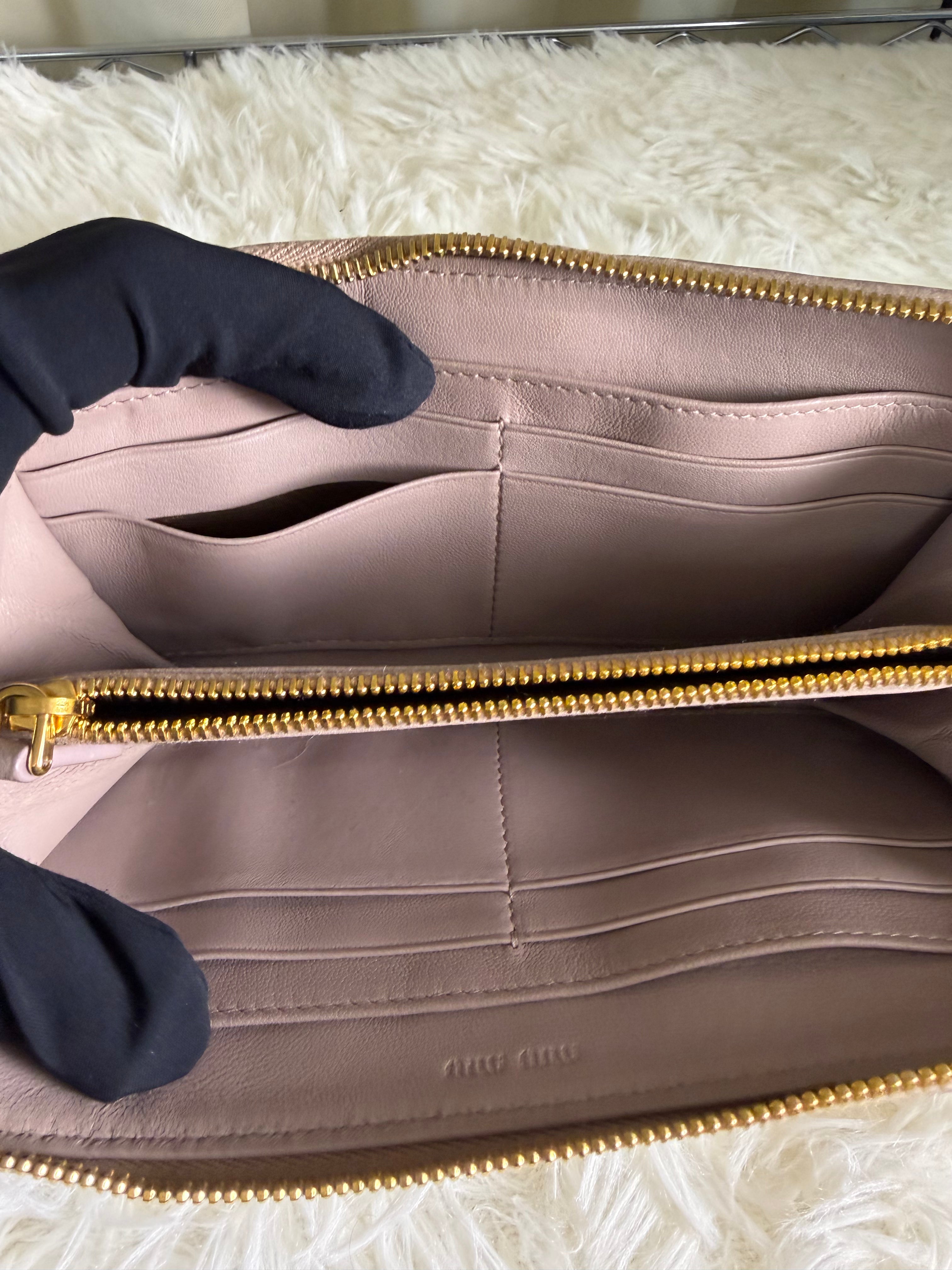 Portafoglio con Zip Miu Miu