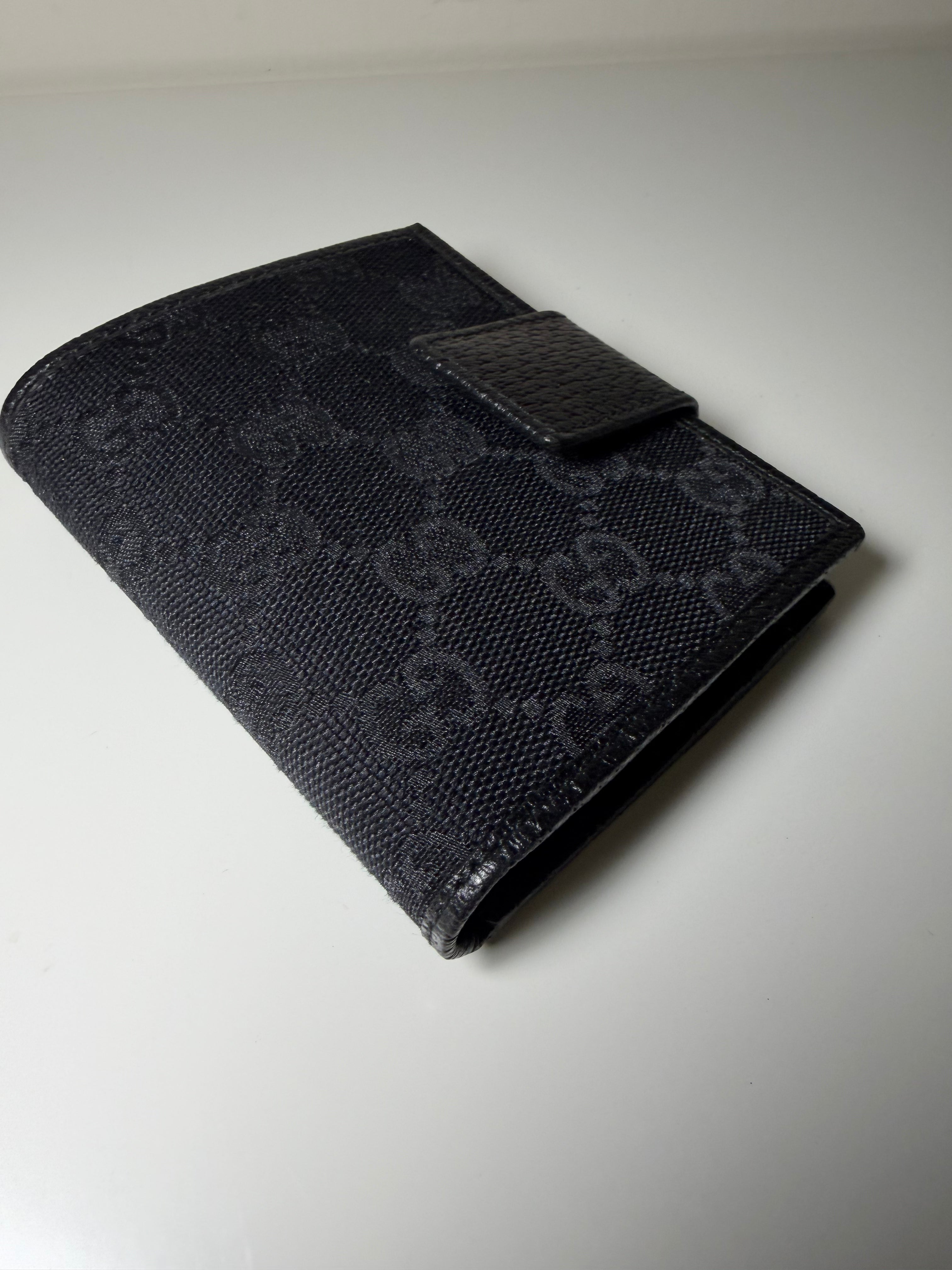 Portafoglio Bi-Fold Gucci in Tela GG Nera e Pelle