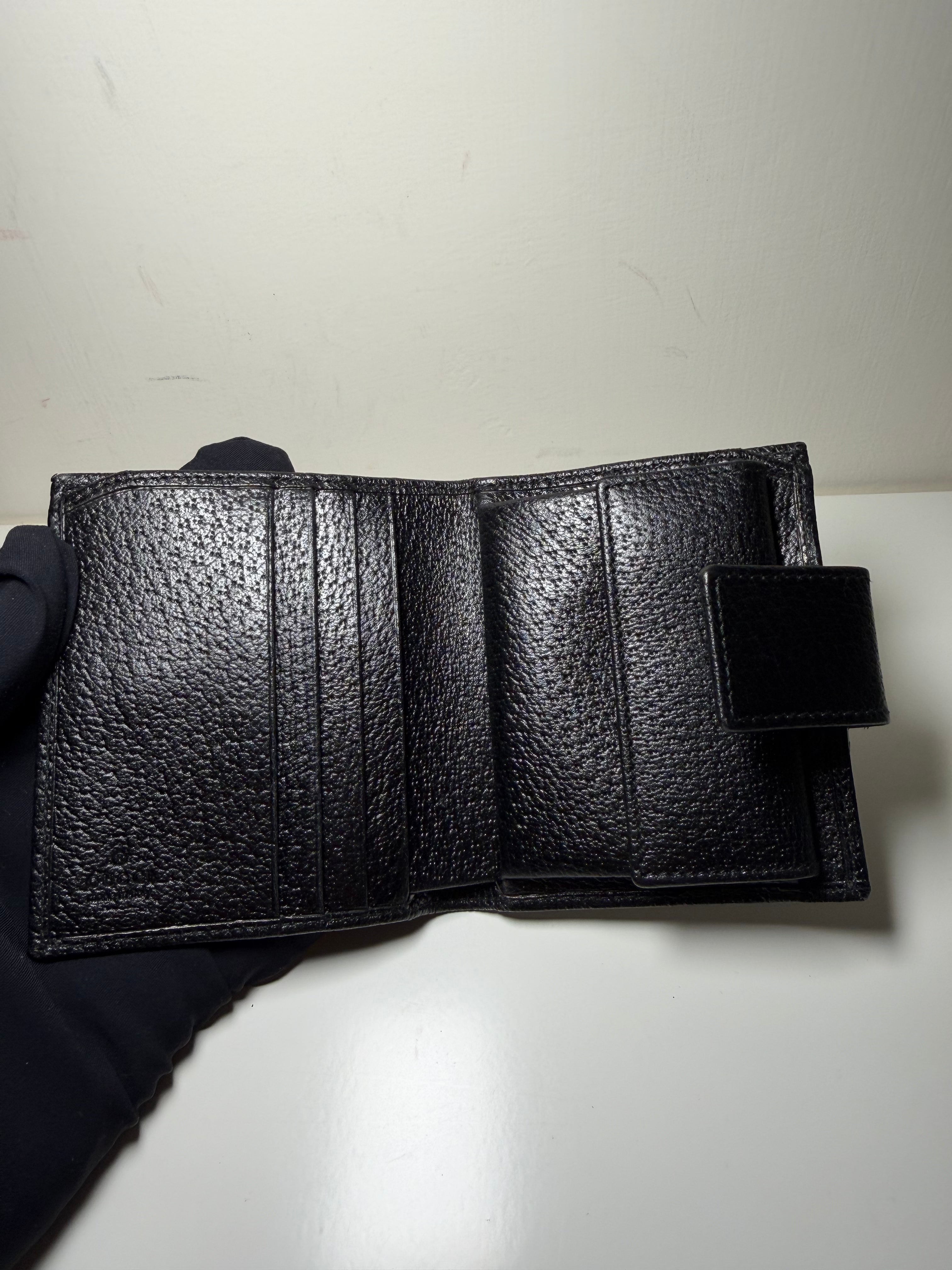 Portafoglio Bi-Fold Gucci in Tela GG Nera e Pelle