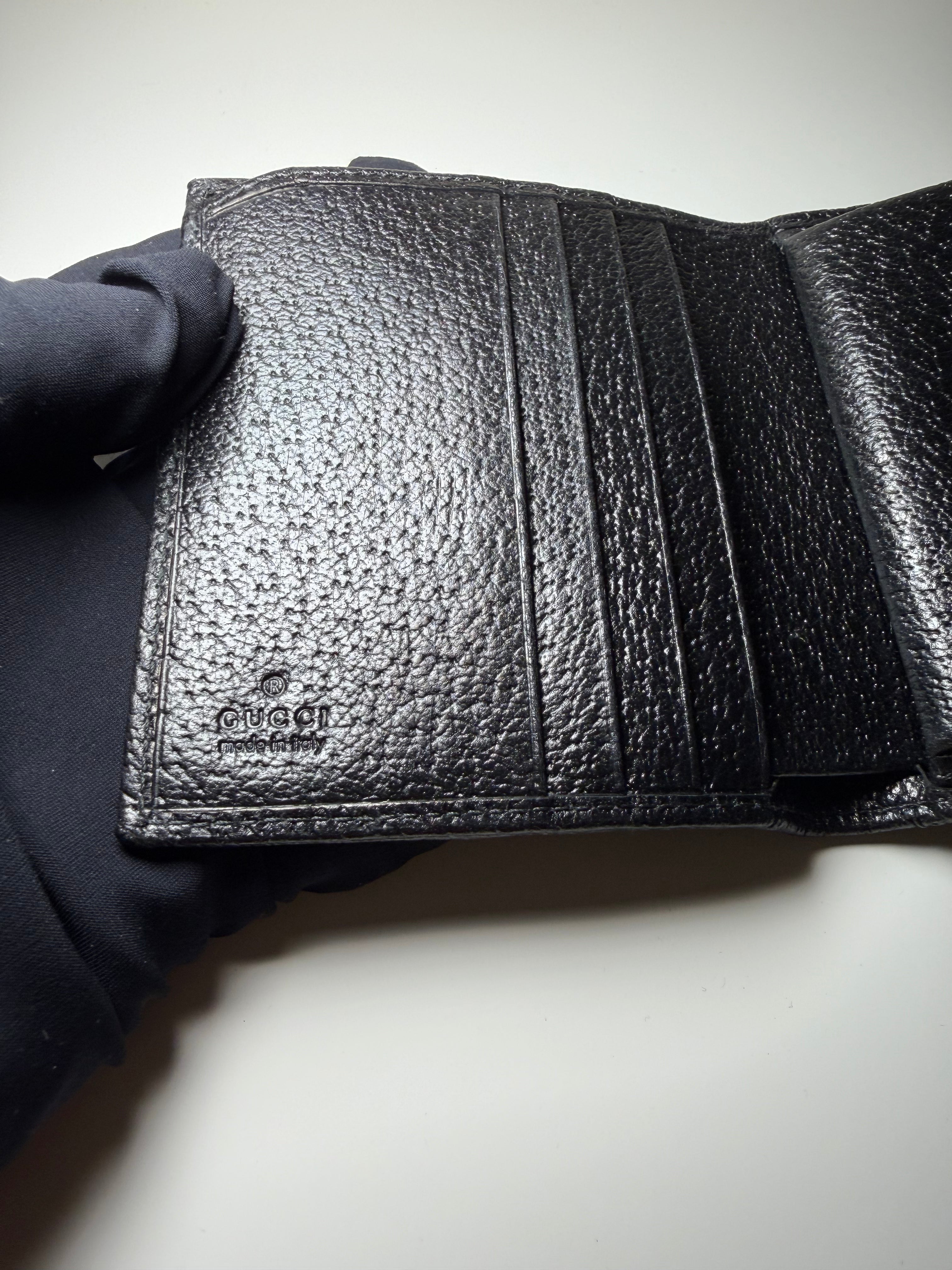 Portafoglio Bi-Fold Gucci in Tela GG Nera e Pelle