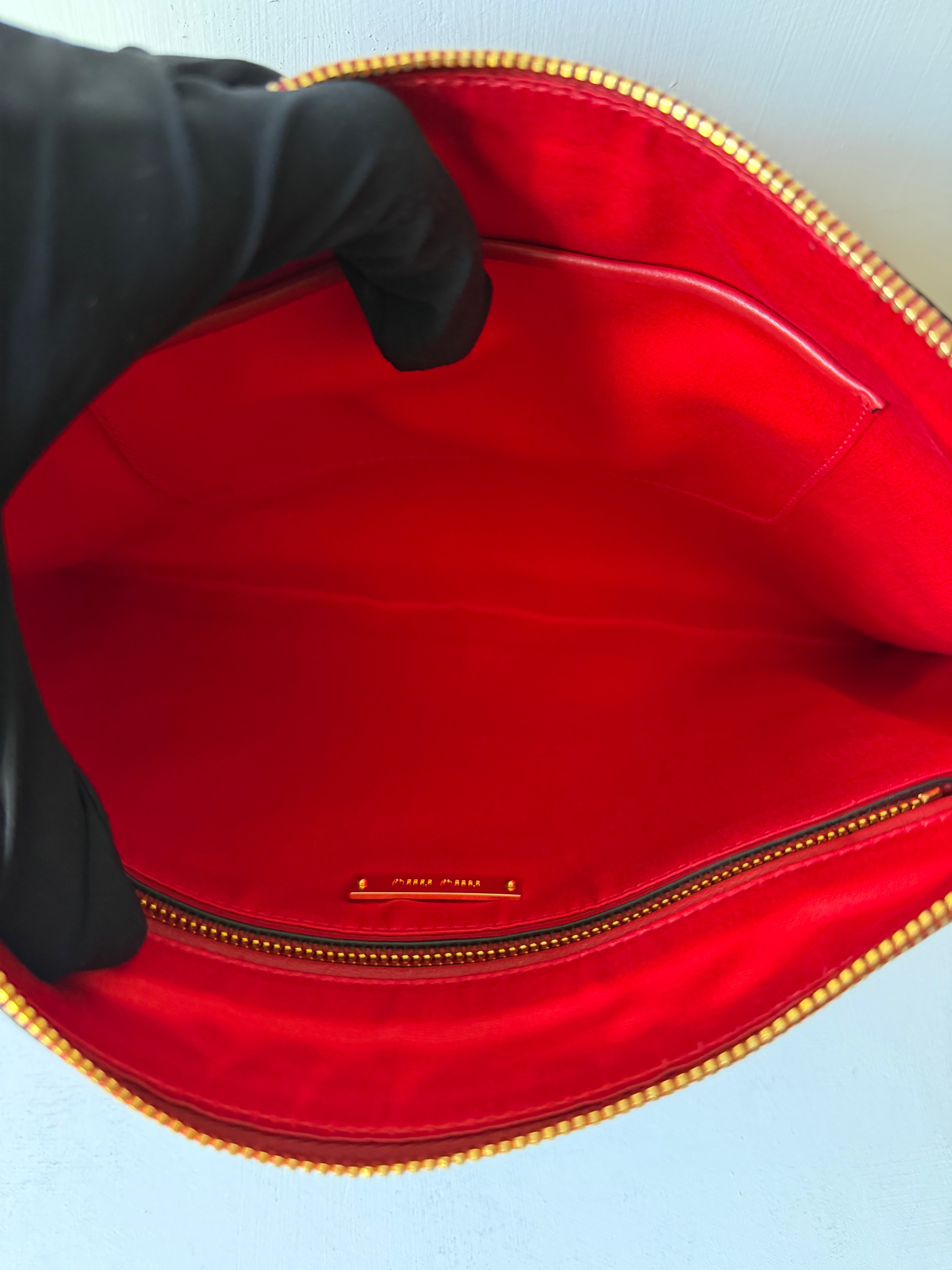 Pochette in Pelle Rossa di Miu Miu