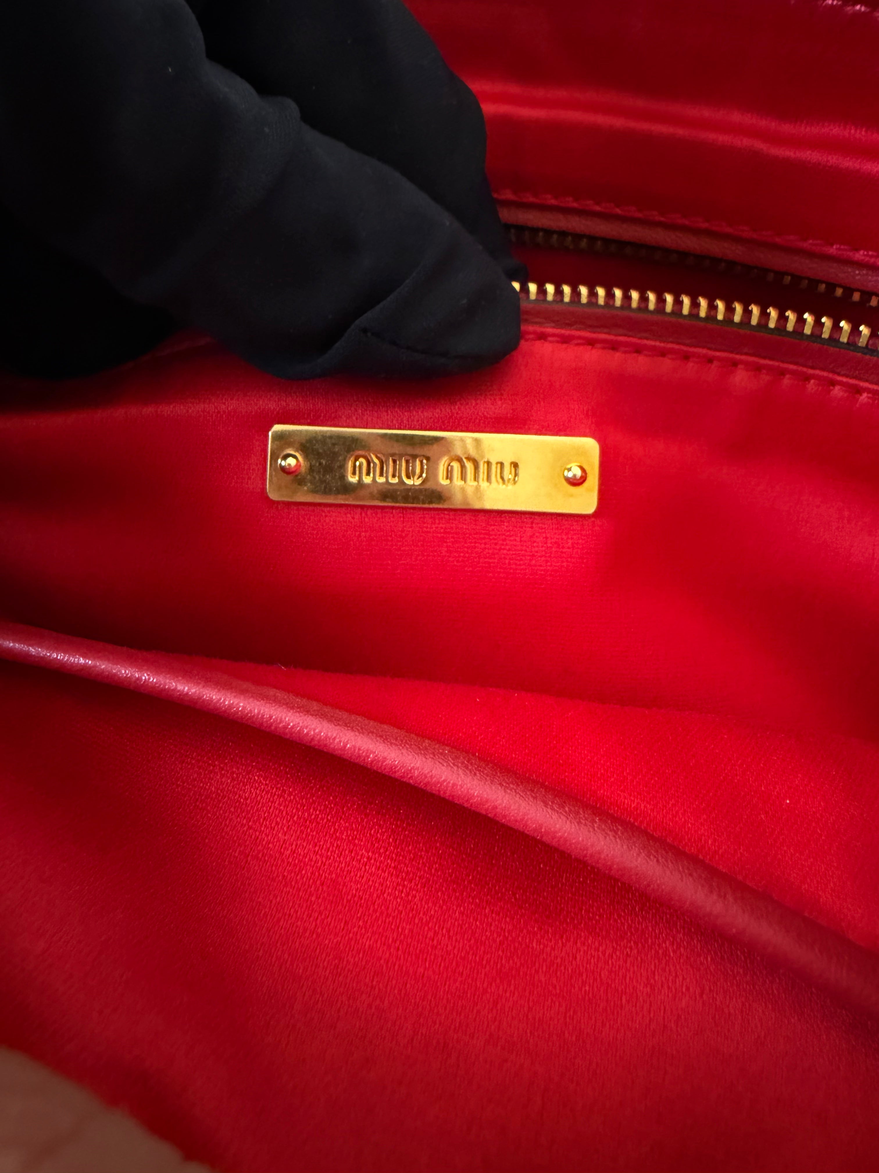 Pochette in Pelle Rossa di Miu Miu