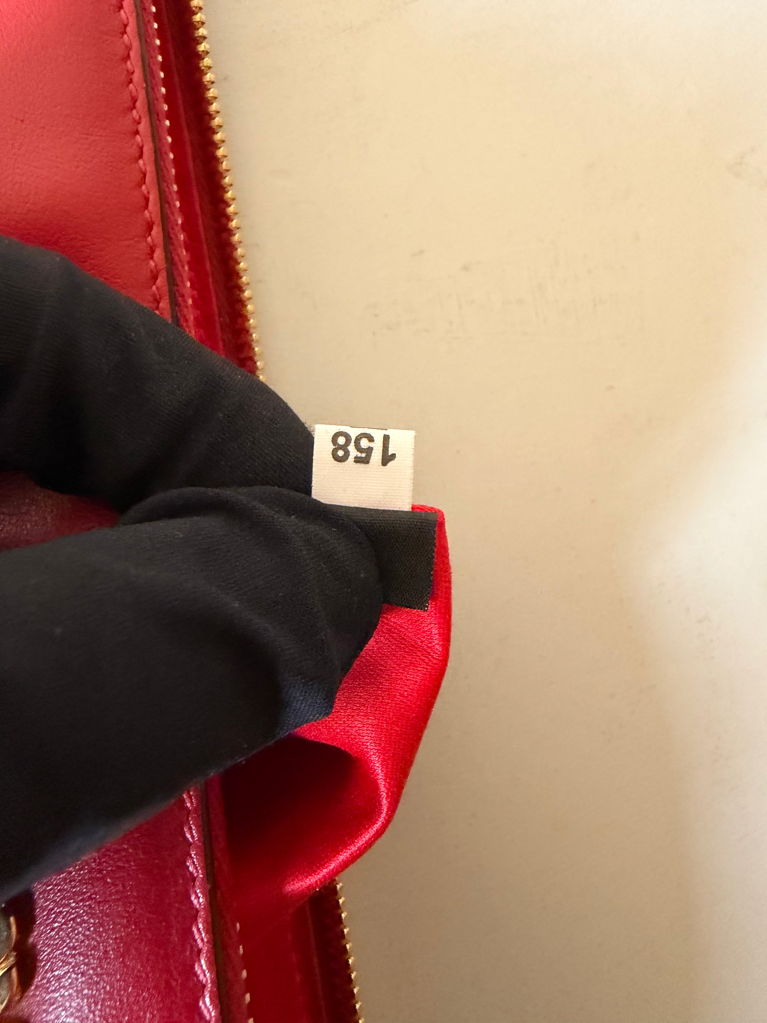 Pochette in Pelle Rossa di Miu Miu