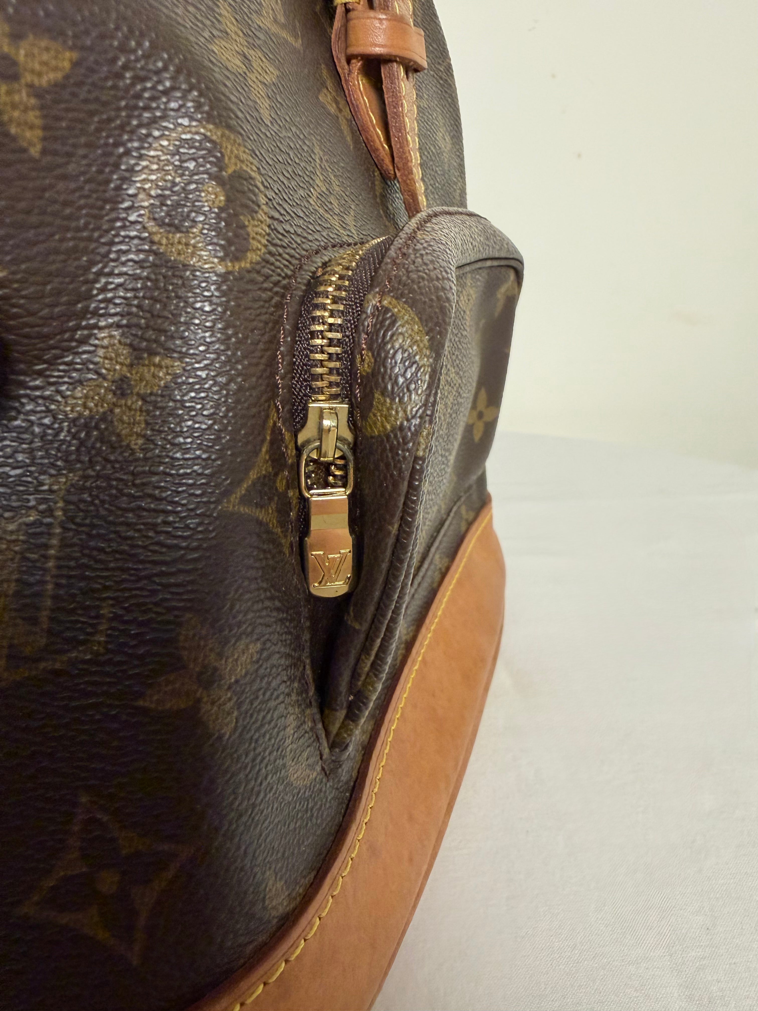 Louis Vuitton Montsouris in tela Monogram