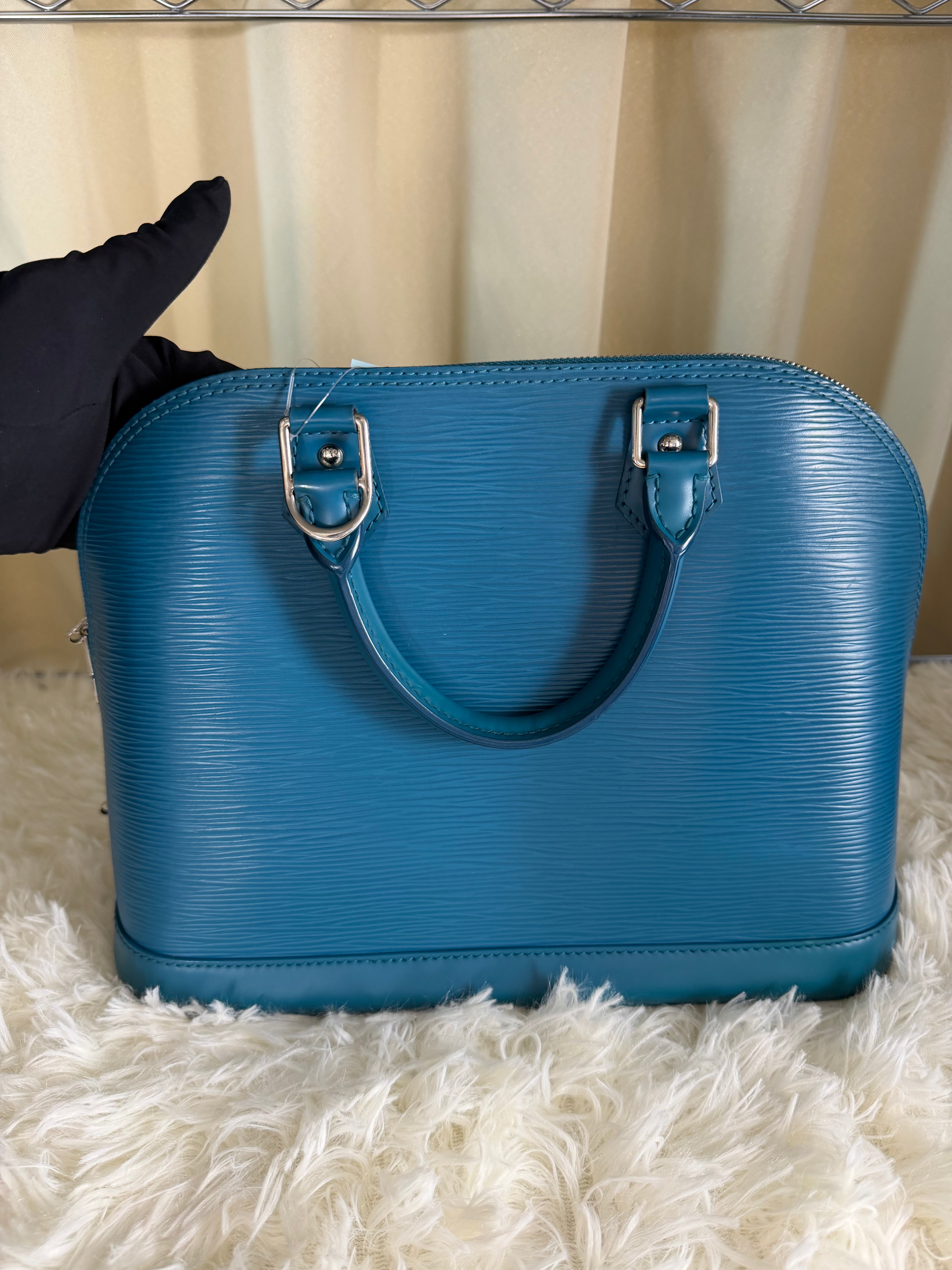 Borsa Louis Vuitton Alma in Pelle Epi di Colore Turchese