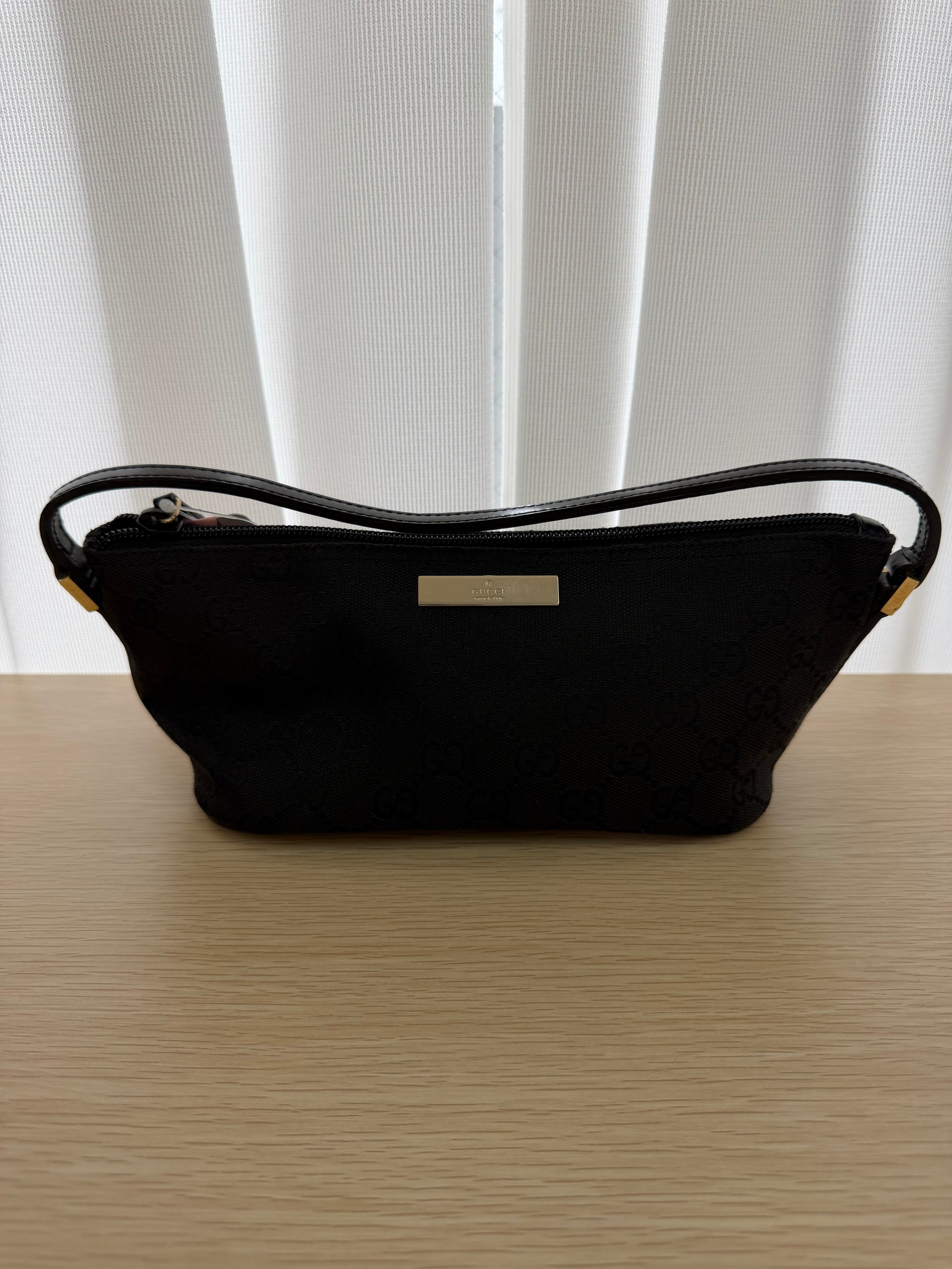 Borsa Pochette Vintage in Tessuto GG Nero di Gucci