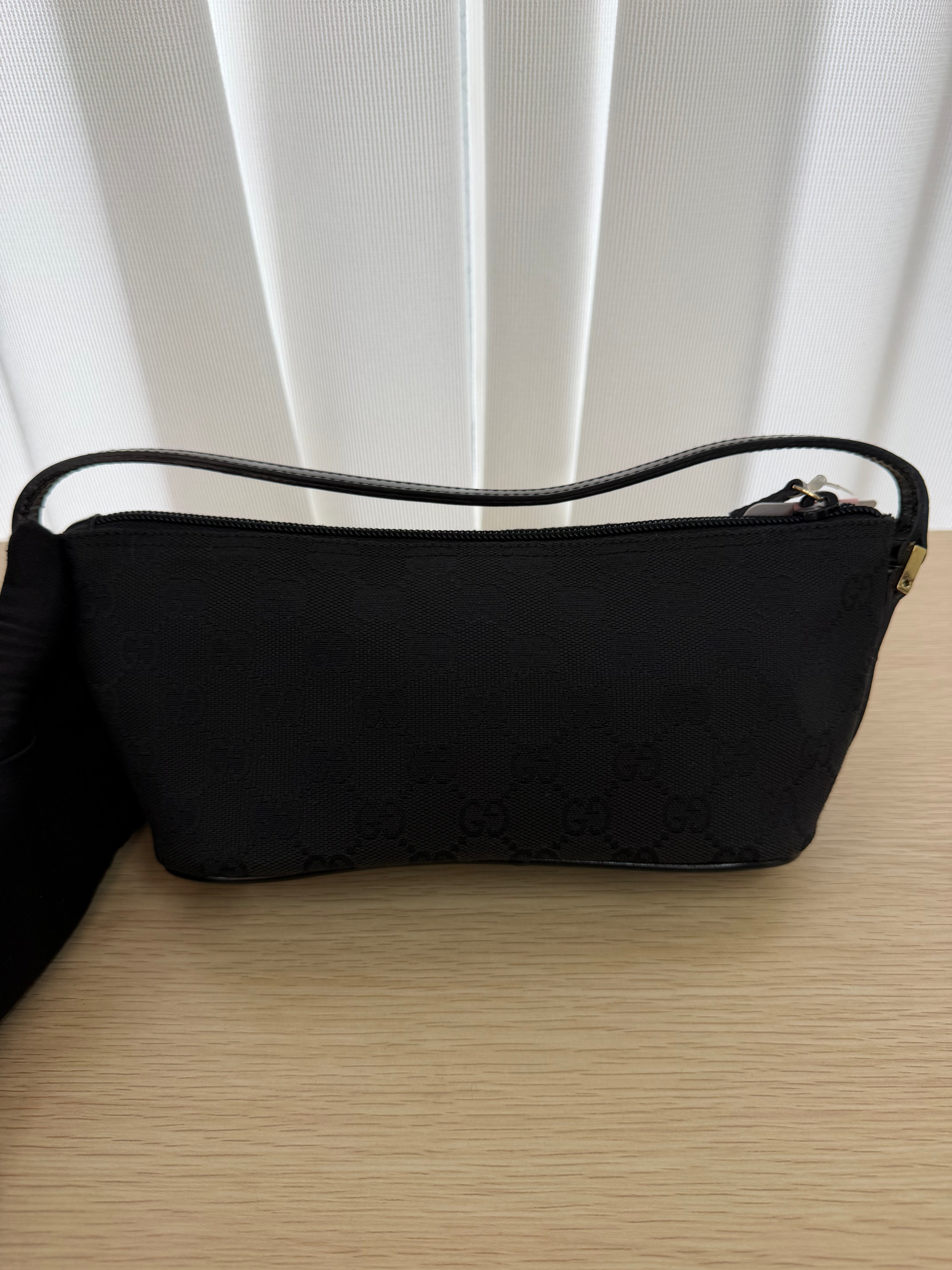 Borsa Pochette Vintage in Tessuto GG Nero di Gucci