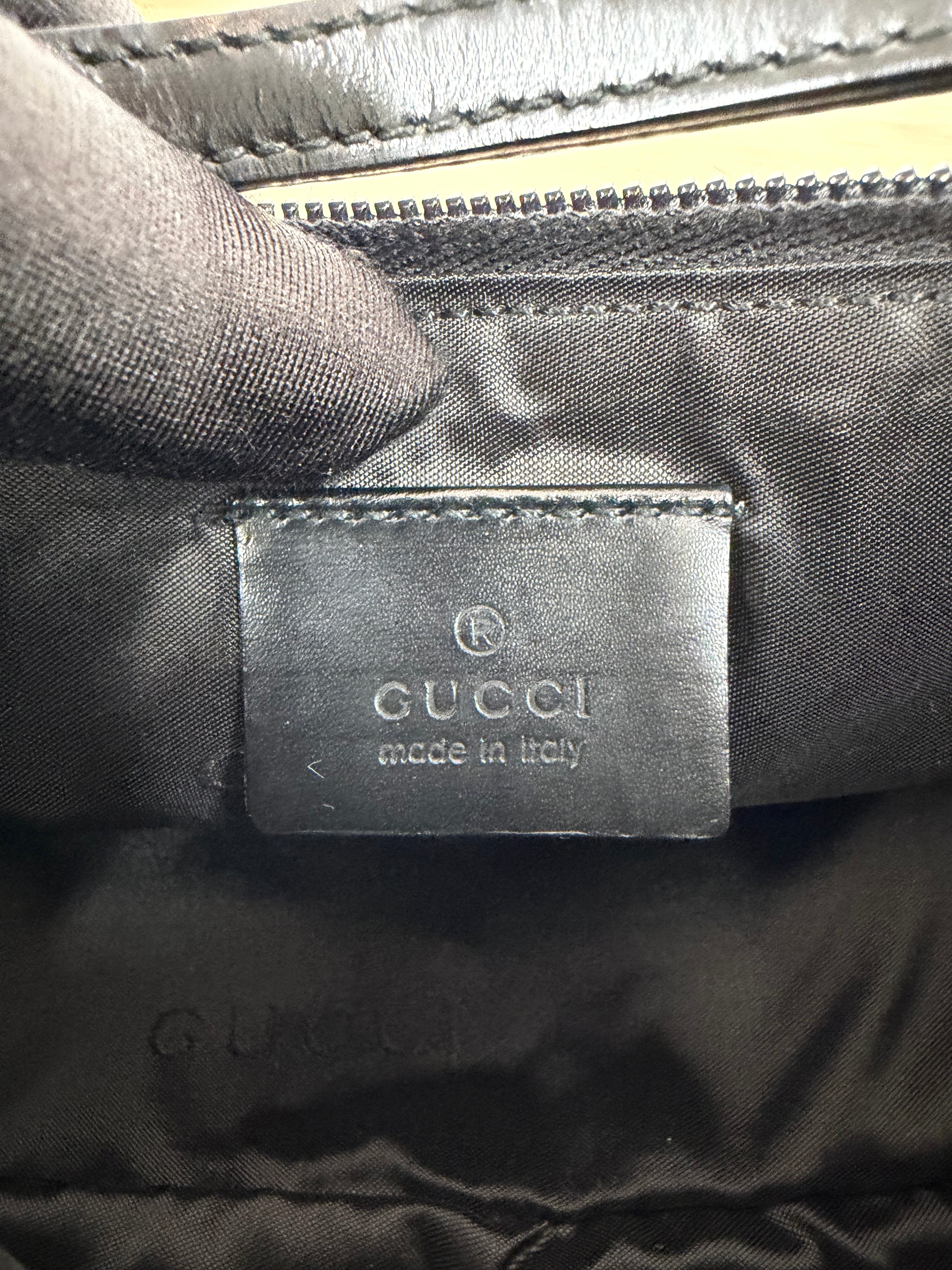 Borsa Pochette Vintage in Tessuto GG Nero di Gucci