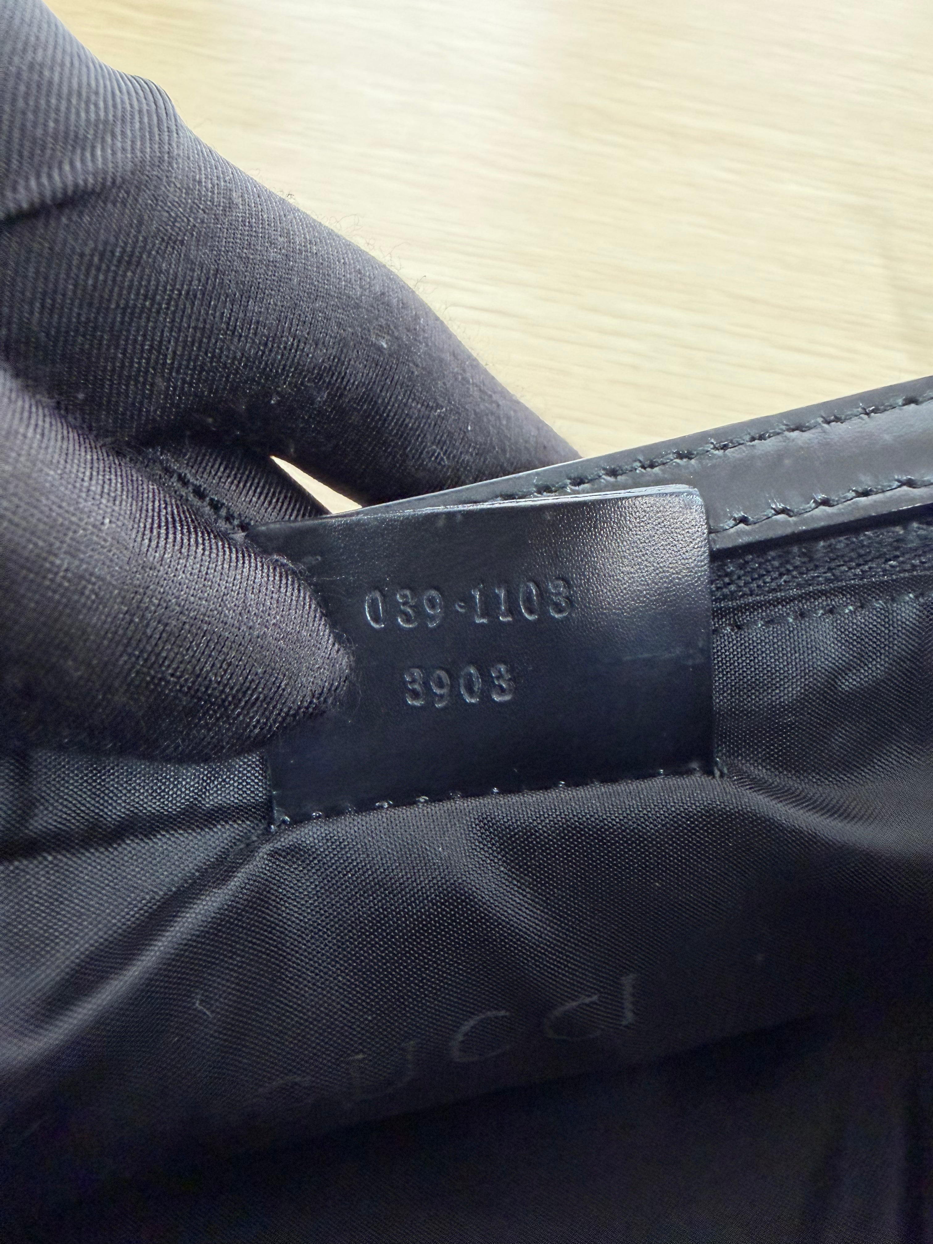 Borsa Pochette Vintage in Tessuto GG Nero di Gucci