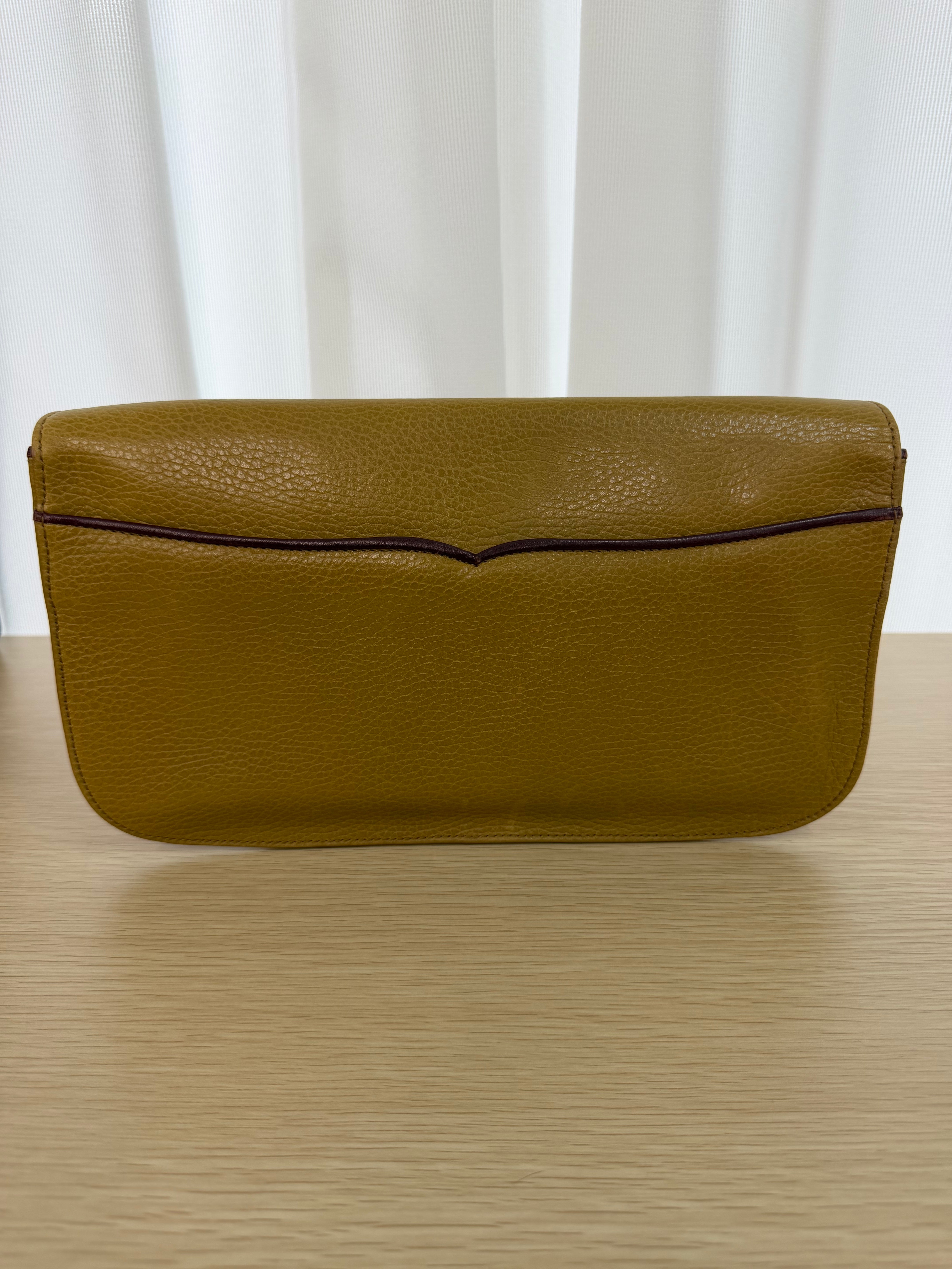 Pochette Vintage di  Cartier in Pelle Martellata