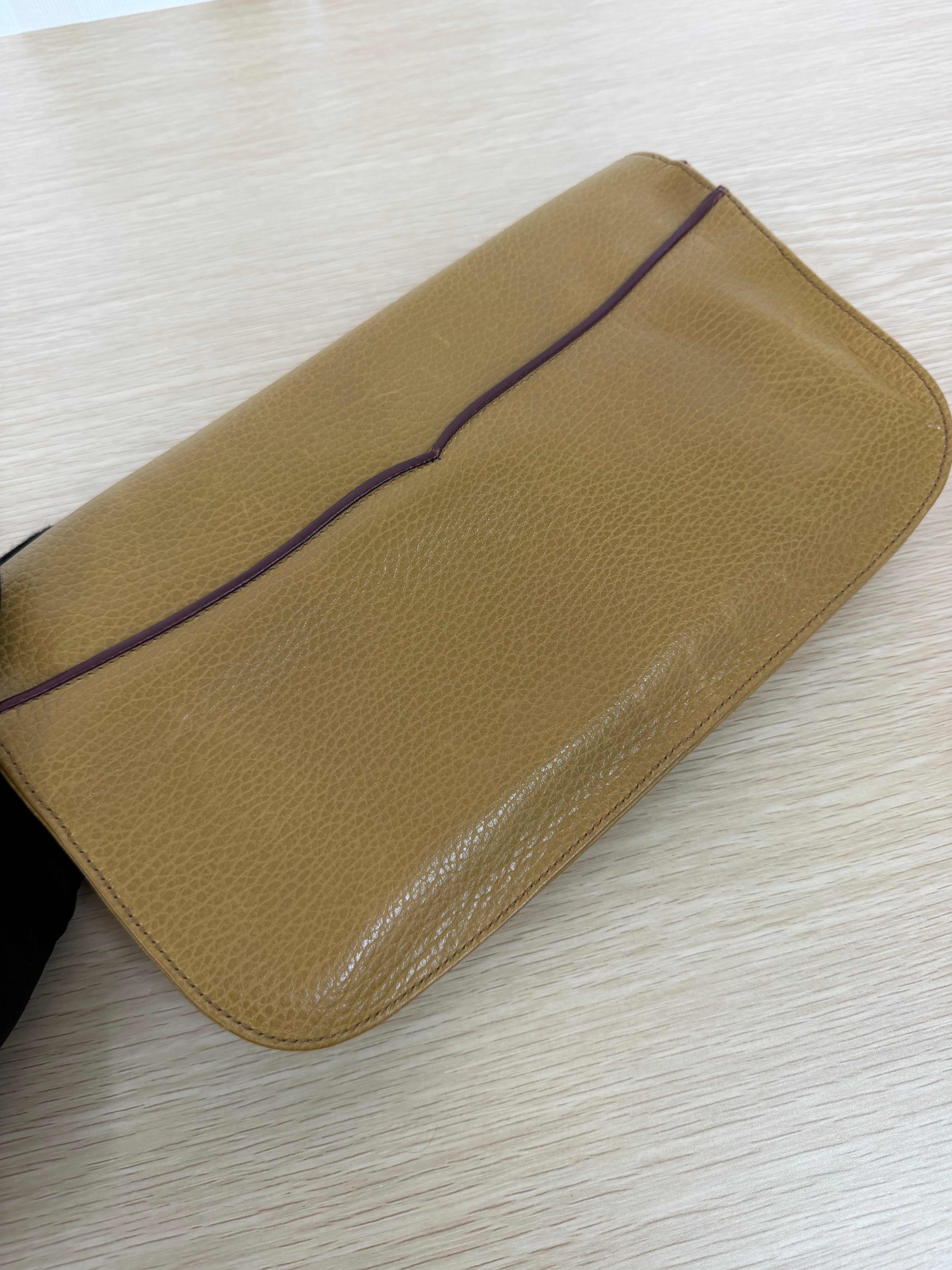 Pochette Vintage di  Cartier in Pelle Martellata