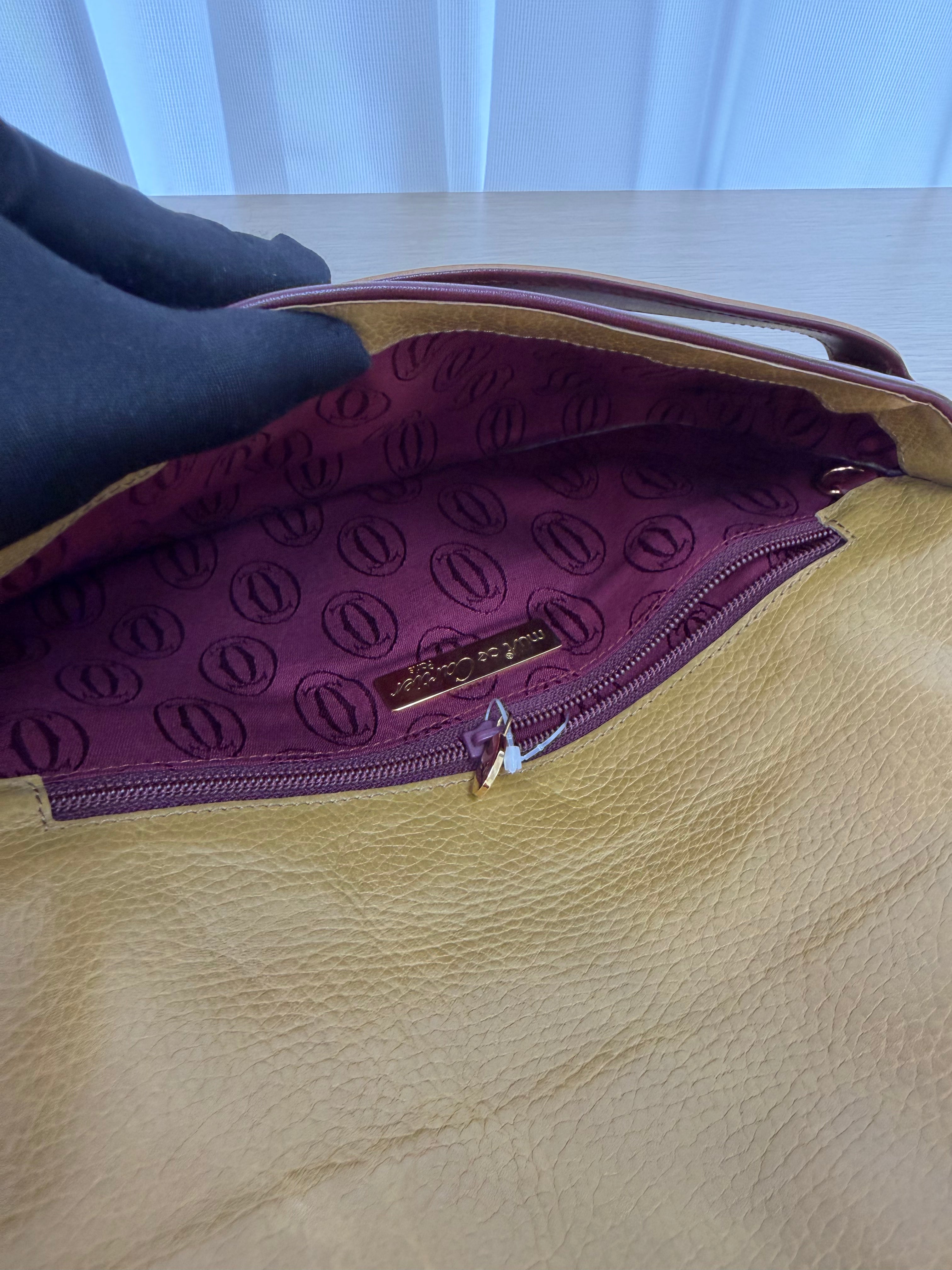 Pochette Vintage di  Cartier in Pelle Martellata