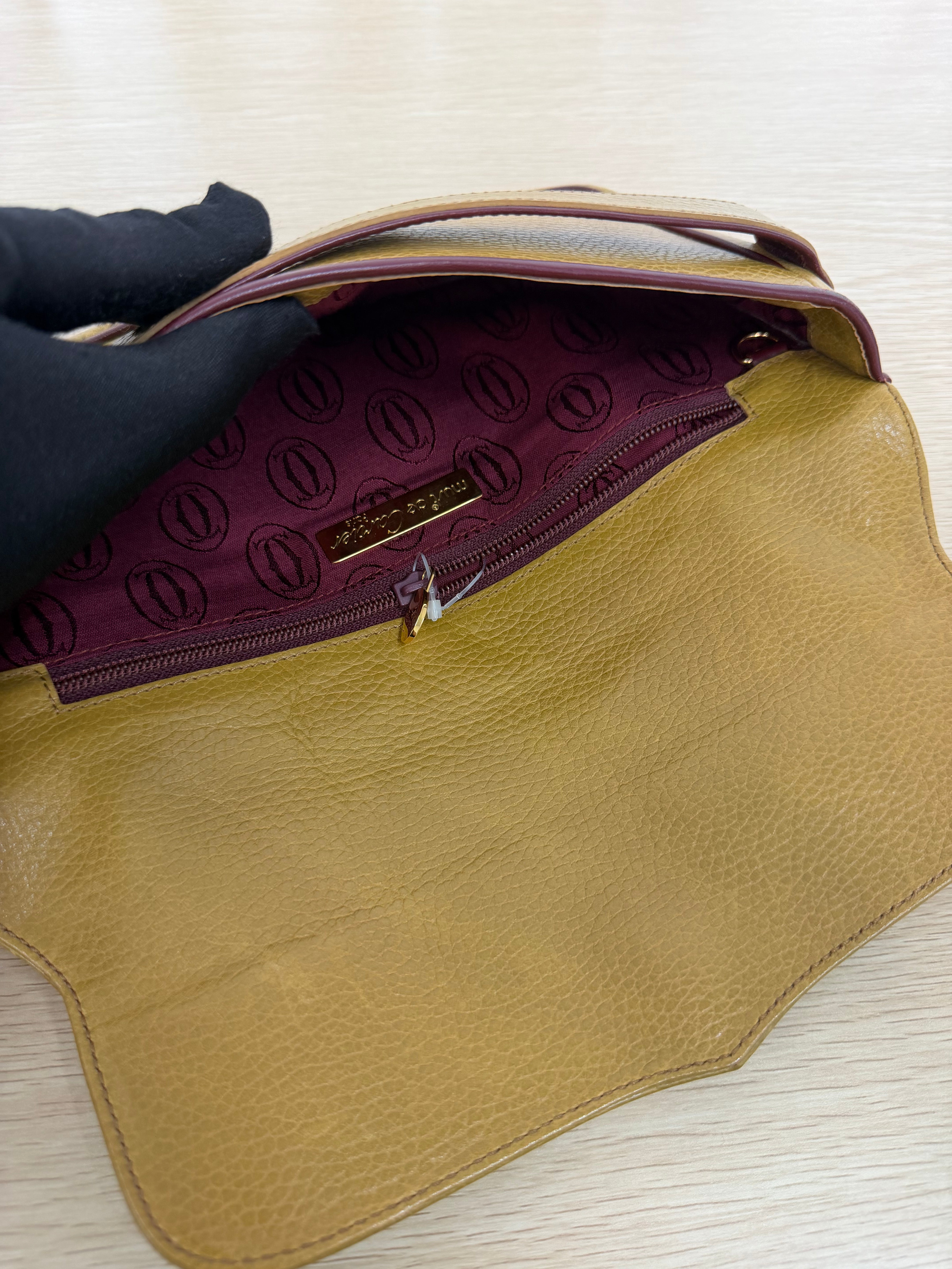 Pochette Vintage di  Cartier in Pelle Martellata
