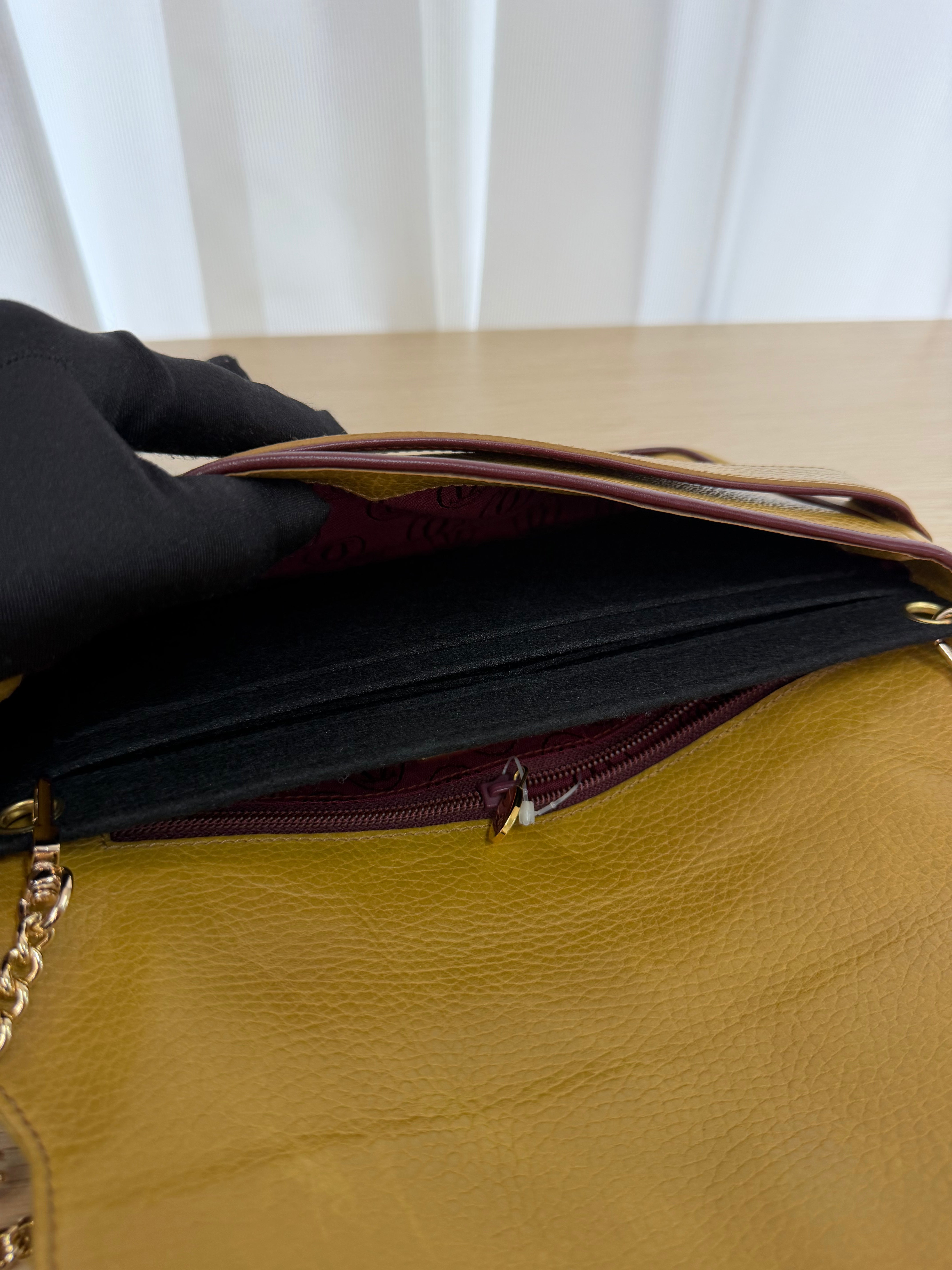 Pochette Vintage di  Cartier in Pelle Martellata