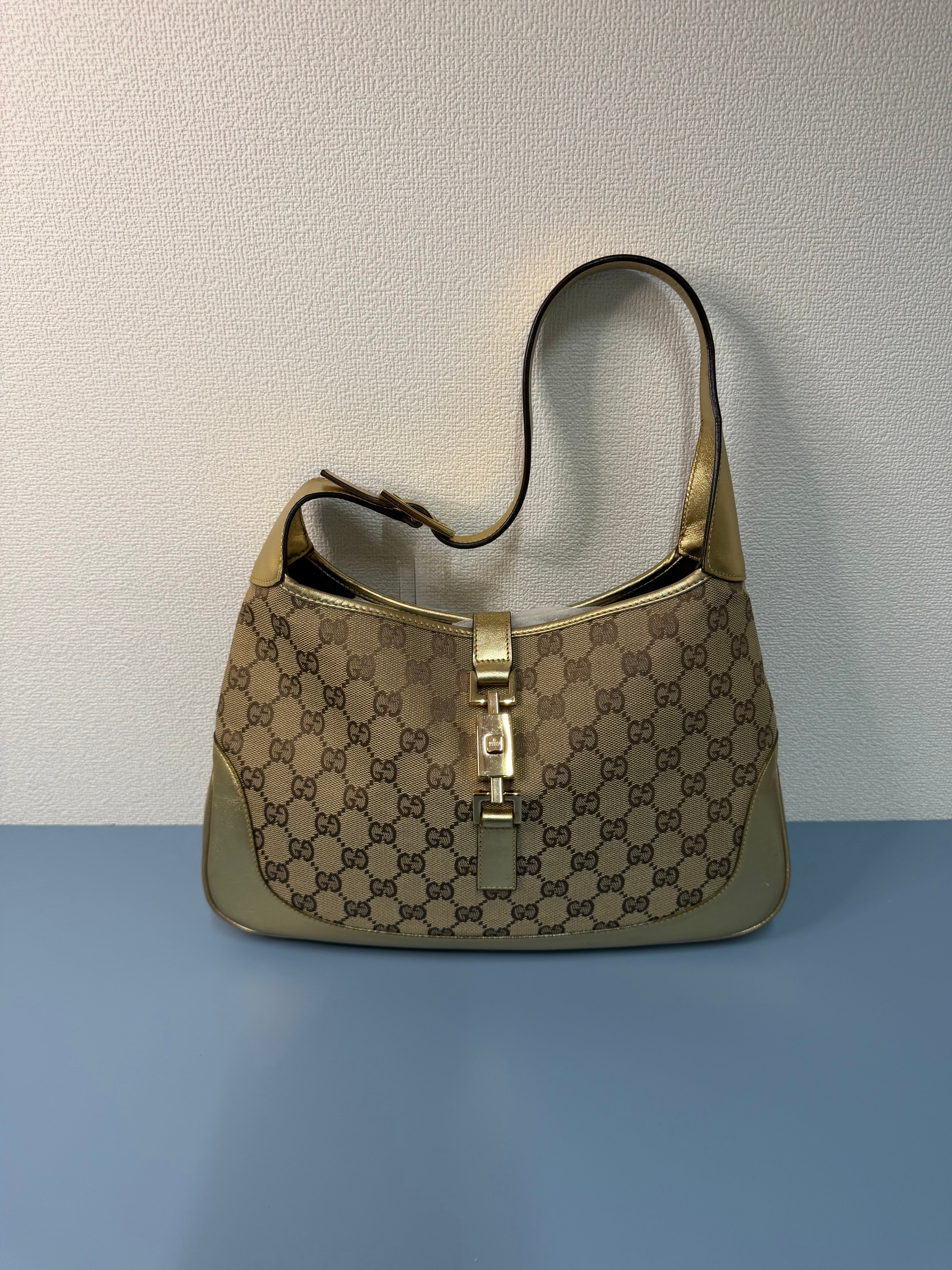 Borsa Jackie di Gucci con Finiture in Pelle Metallizzata Dorata