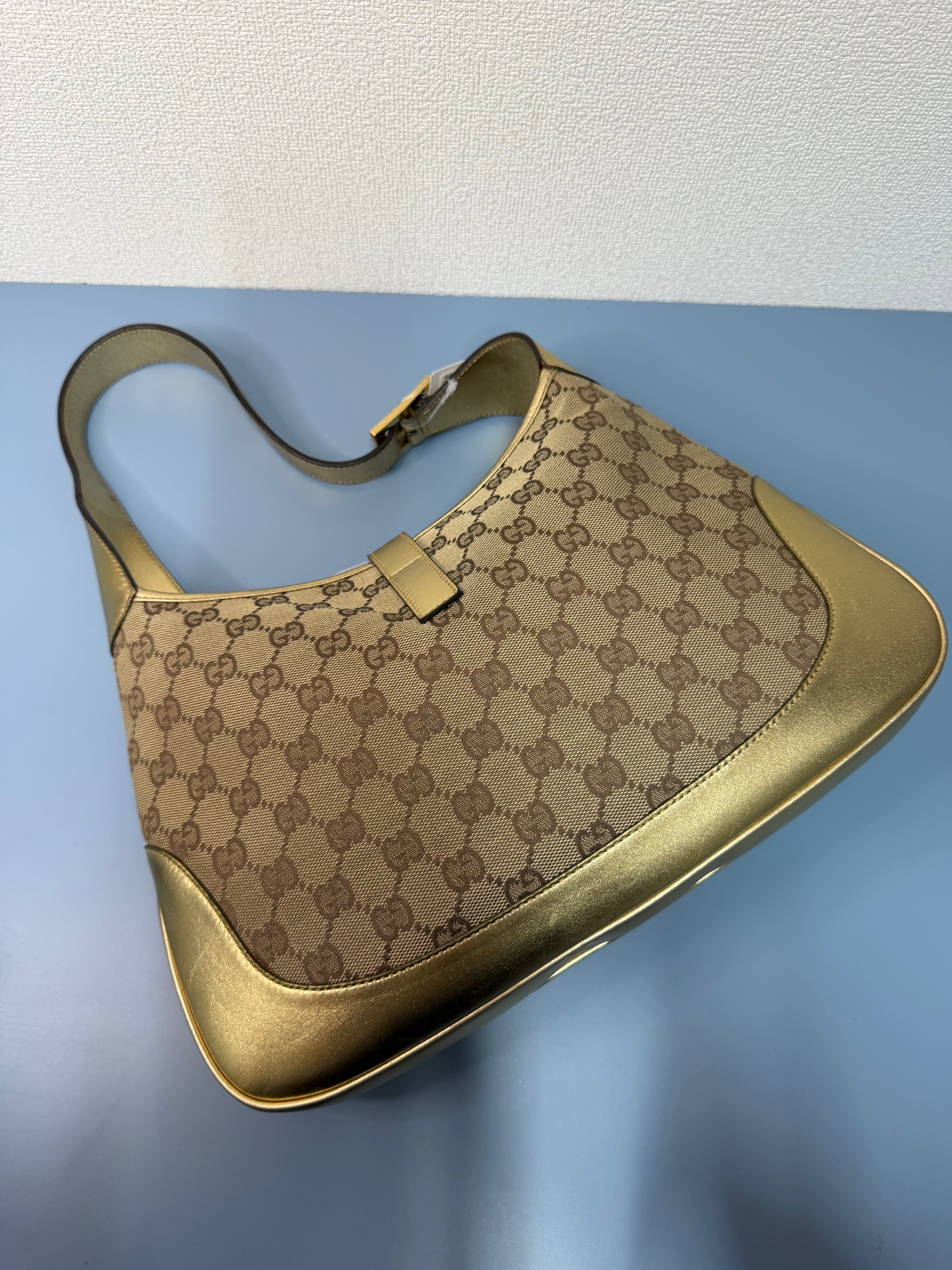 Borsa Jackie di Gucci con Finiture in Pelle Metallizzata Dorata