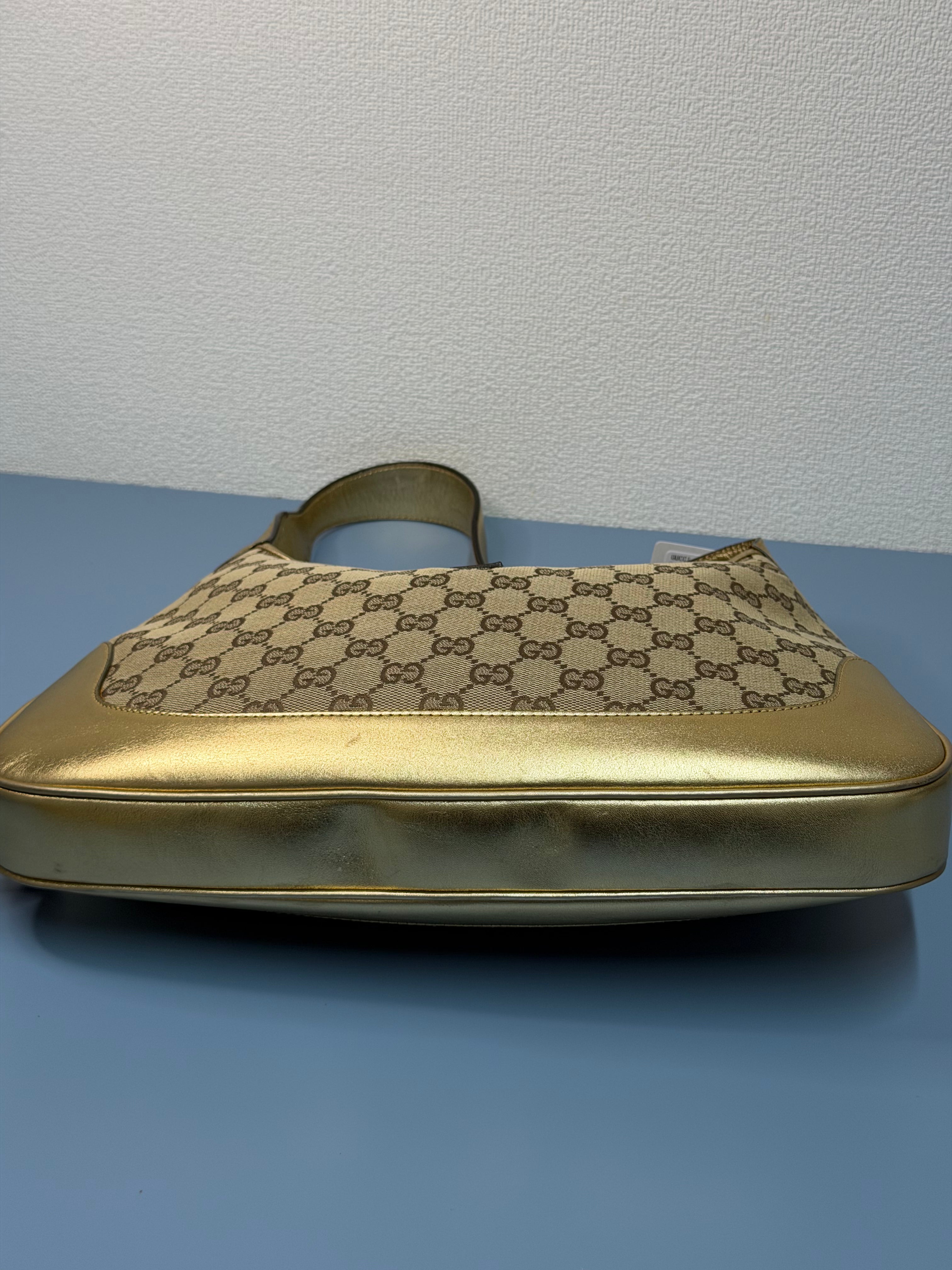 Borsa Jackie di Gucci con Finiture in Pelle Metallizzata Dorata