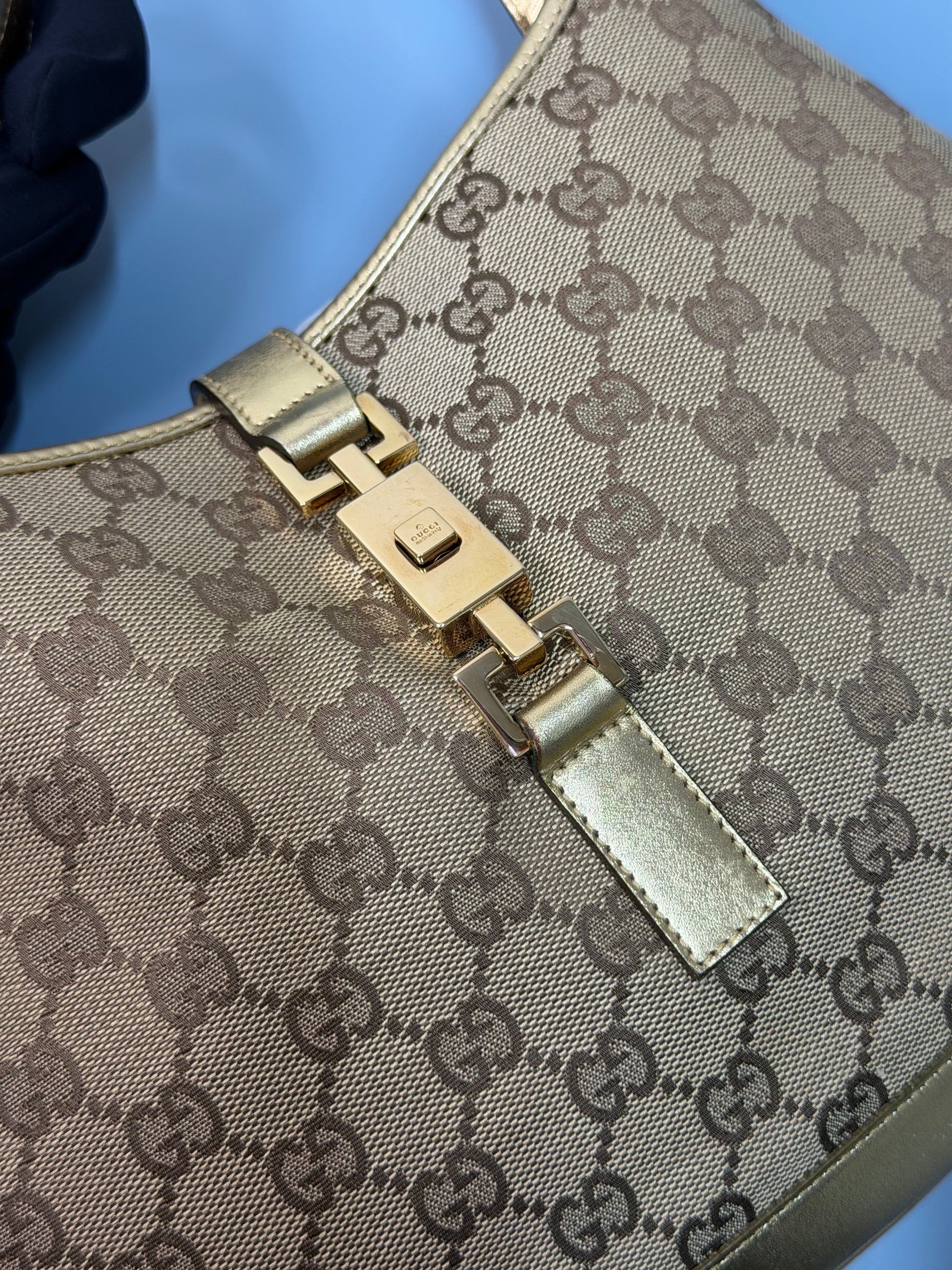Borsa Jackie di Gucci con Finiture in Pelle Metallizzata Dorata